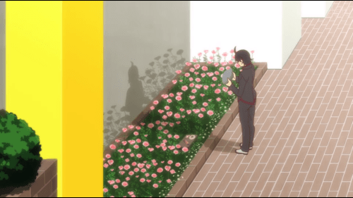 Koyomimonogatari / Episode 1 / Araragi looking at the "stone" block before him